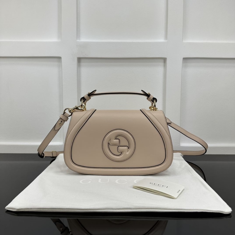 G*u*i top handle bags